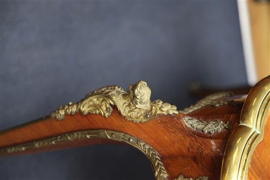 A French Louis XV style serpentine shape kingwood and ormolu mounted bureau plat, W.4ft 7in.